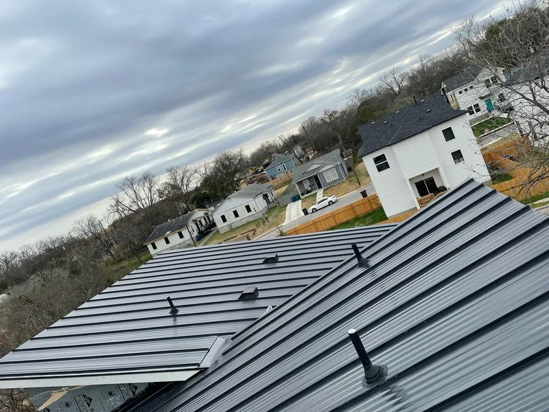 Standing seam metal roof panels with vents for Skylight Repair in Malone